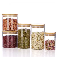 

factory direct multi size high borosilicate glass storage jar with wood lid