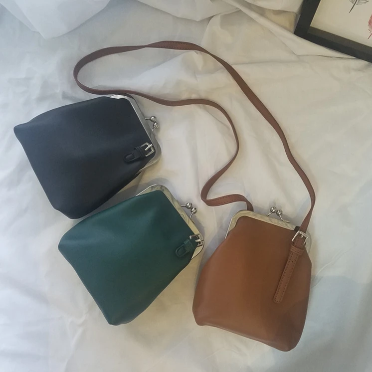 

XP1416 Explosive retro solid color PU small square bag clip bag handbags wholesale china