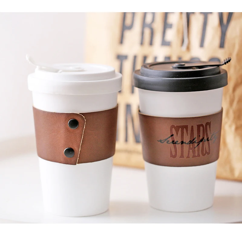 

Seaygift custom logo double wall insulated drinking tea cup keep warm portable hot ceramics mug with leather cover and lid, Customized colors acceptable