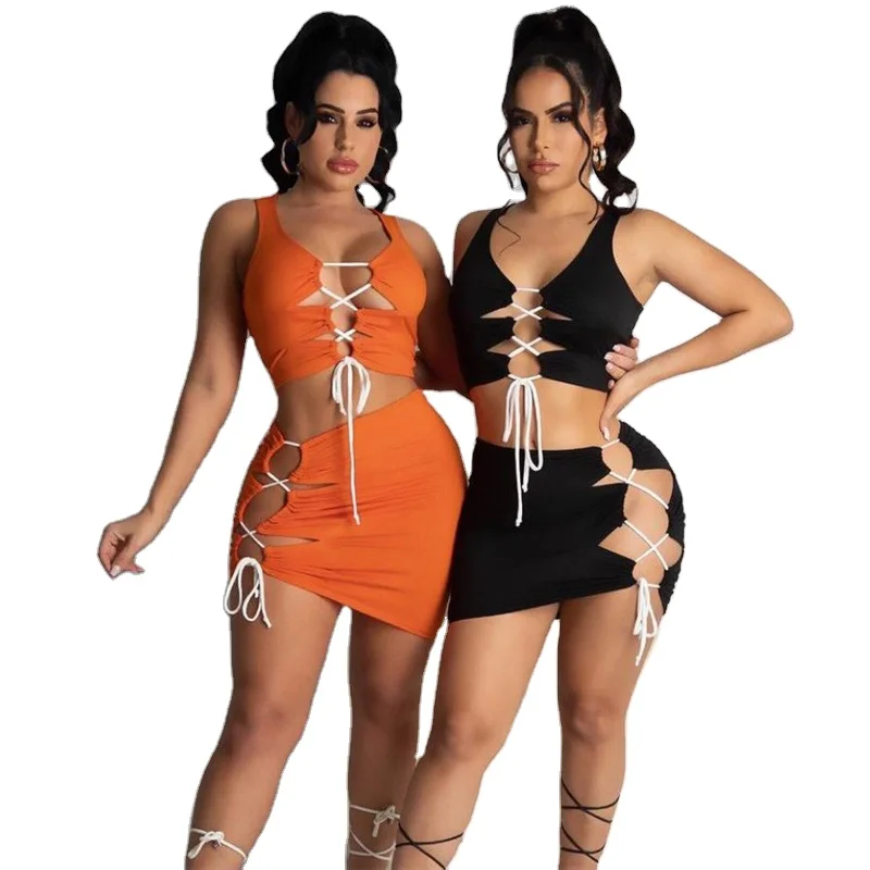 

Summer tight elastic hollow-out vest with navel crop + wrap hip tie rope sexy MINI skirt 2 piece sets