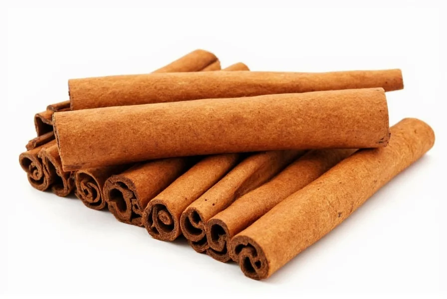 Close-up of hands breaking cinnamon sticks over a wooden cutting board with measuring spoons nearby