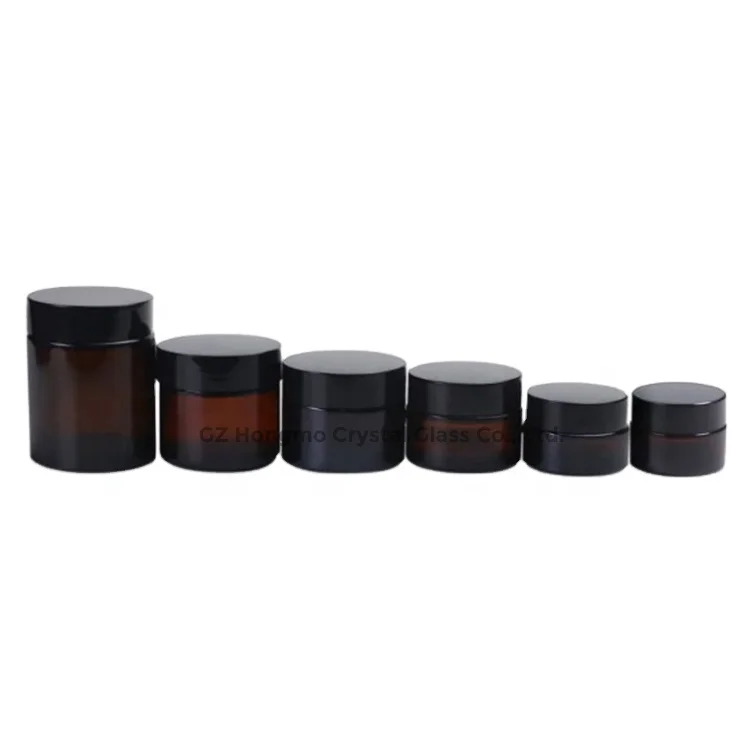 

Wholesale cosmetic packaging 20ml 30ml 50ml amber glass jar with silver gold aluminum metal lids black plastic caps in stock