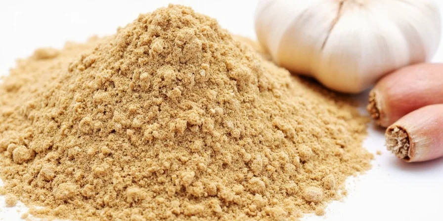 Side-by-side comparison of fresh garlic cloves and garlic powder