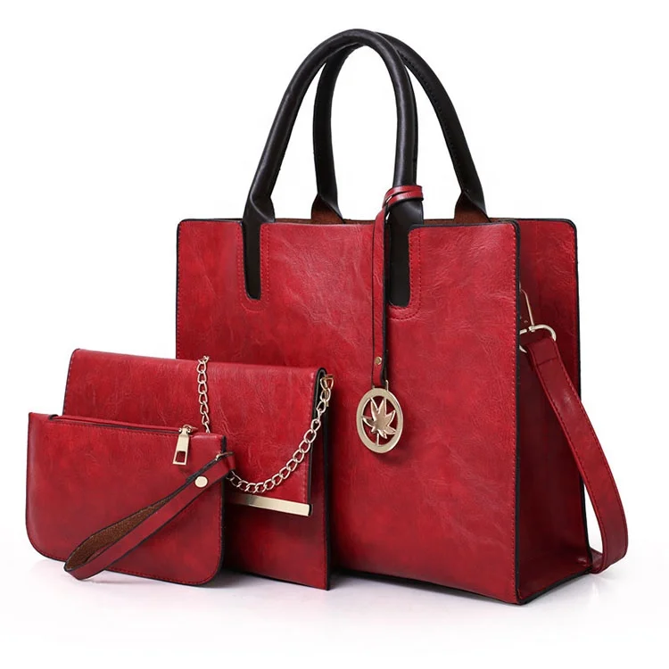 

fashionable square shape ladies bags handbag set with metal pendant