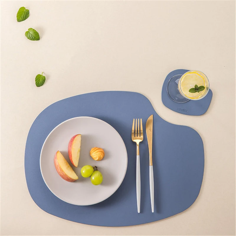 

Factory Wholesales New Design Irregular Waterproof Leather Placemats and Cup Mat for Dining Table