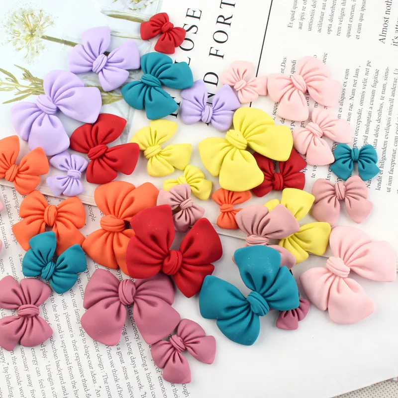 

hot sale good quality large size matte colored flatback resin bowknot cabochons for mobile case decoration