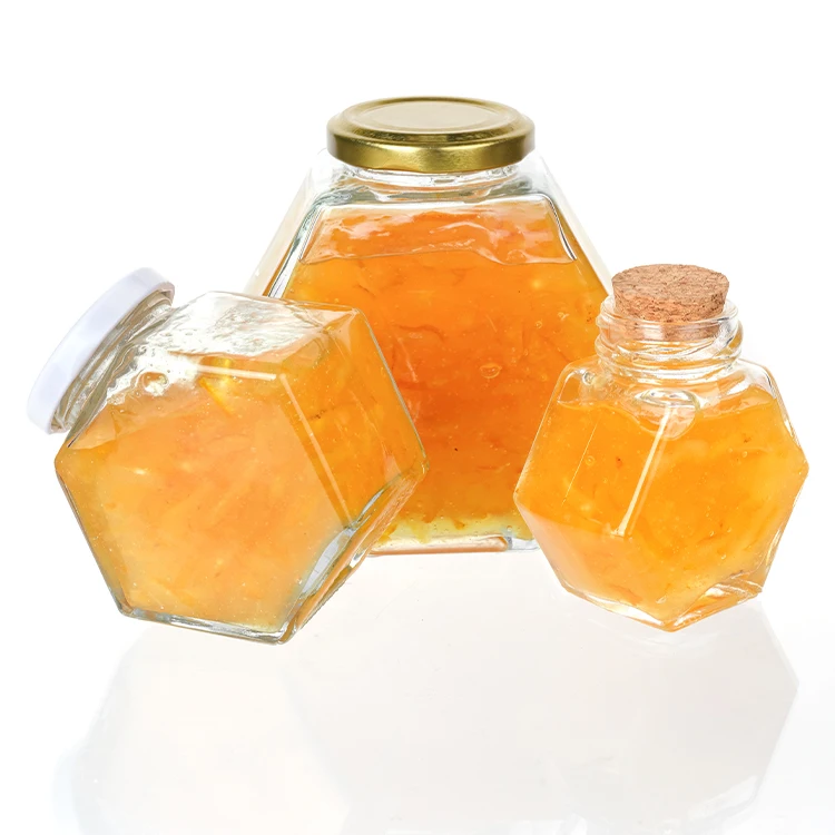 

Hexagon Shape Glass Honey Storage Container Sealed Jar With Wooden Dipper And Cork Lid Cover