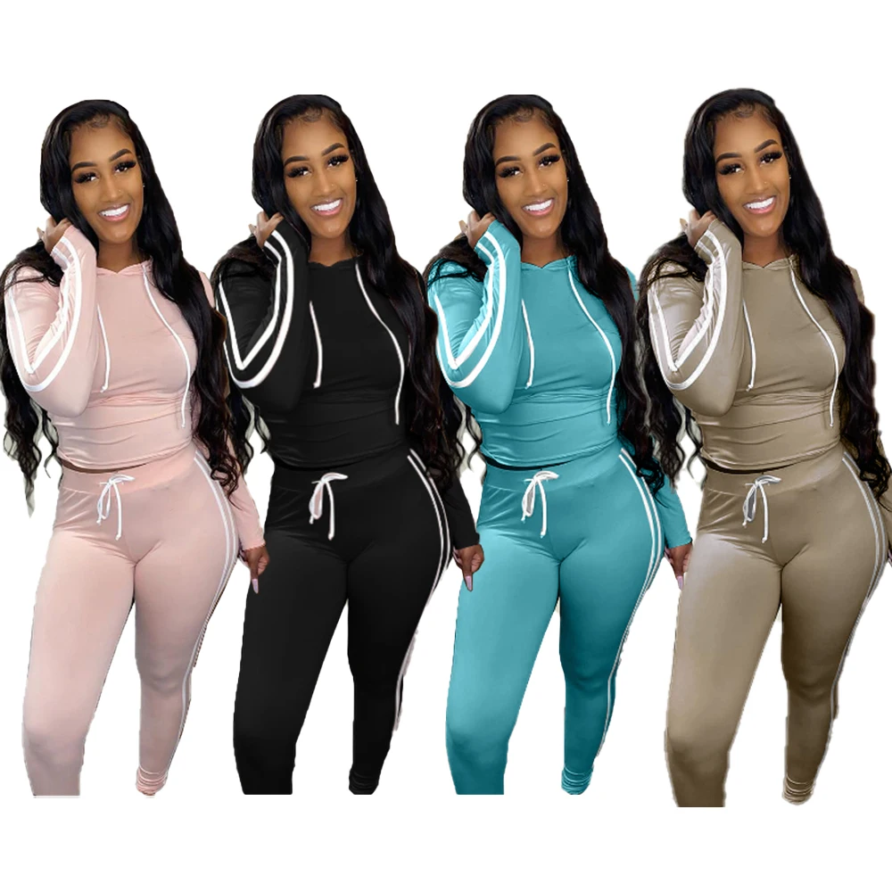

To promote the new solid color long sleeve hooded sports dress two-piece set