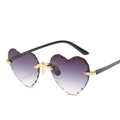 

2021 Wholesale Metal Love Gradient Shades Rimless Heart Glasses Shaped Women Sunglasses, 7 colors