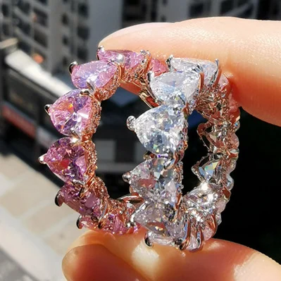 

dimonds around heart band rings