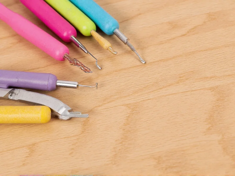 Minimalist DIY nail toolkit on wooden surface