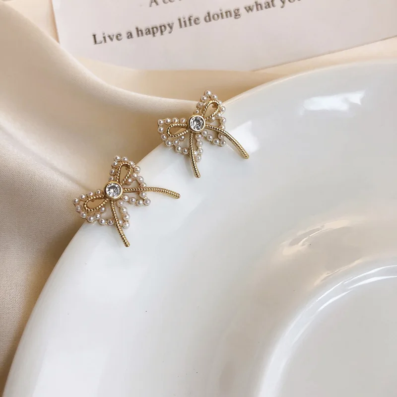 

Best Selling Wholesale Price Shiny Crystal Butterfly Knot Stud Earrings 925 Silver Needle Bow Earring For Women