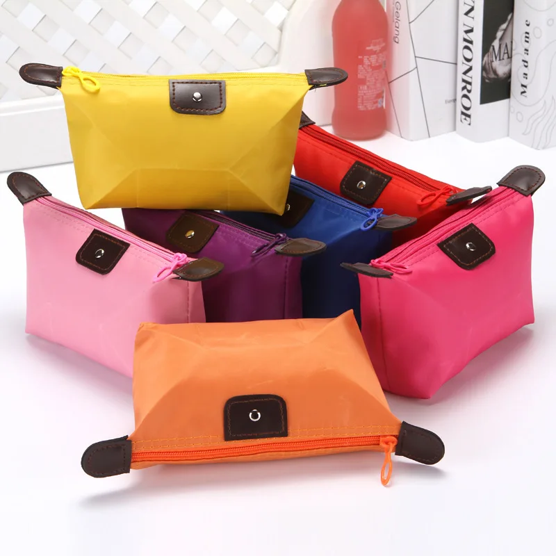 

Lovely dumplings makeup bag candy color folding dumplings bag ingot type storage wash bag wholesale