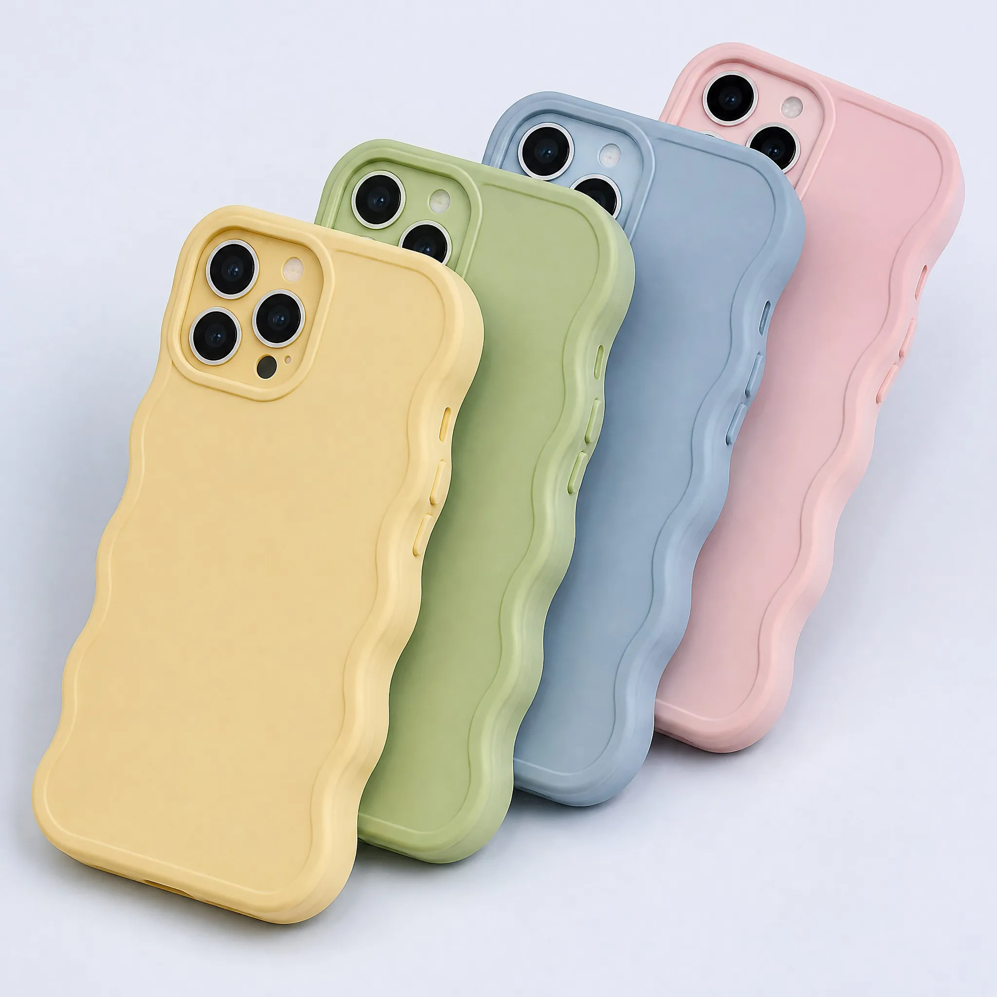 Diagonal Stacking View of 4 Pastel Wavy Silicone Phone Cases: Yellow, Green, Blue, Pink showing Wavy Grip and Metallic Buttons