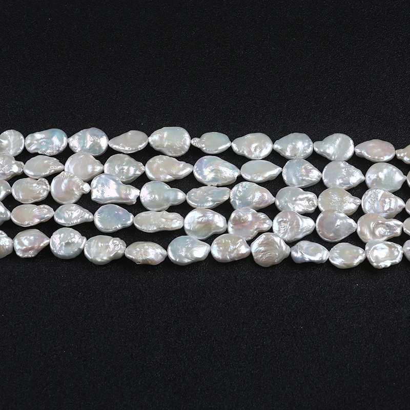 

Wholesale  baroque coin tail loose freshwater pearl strand, White