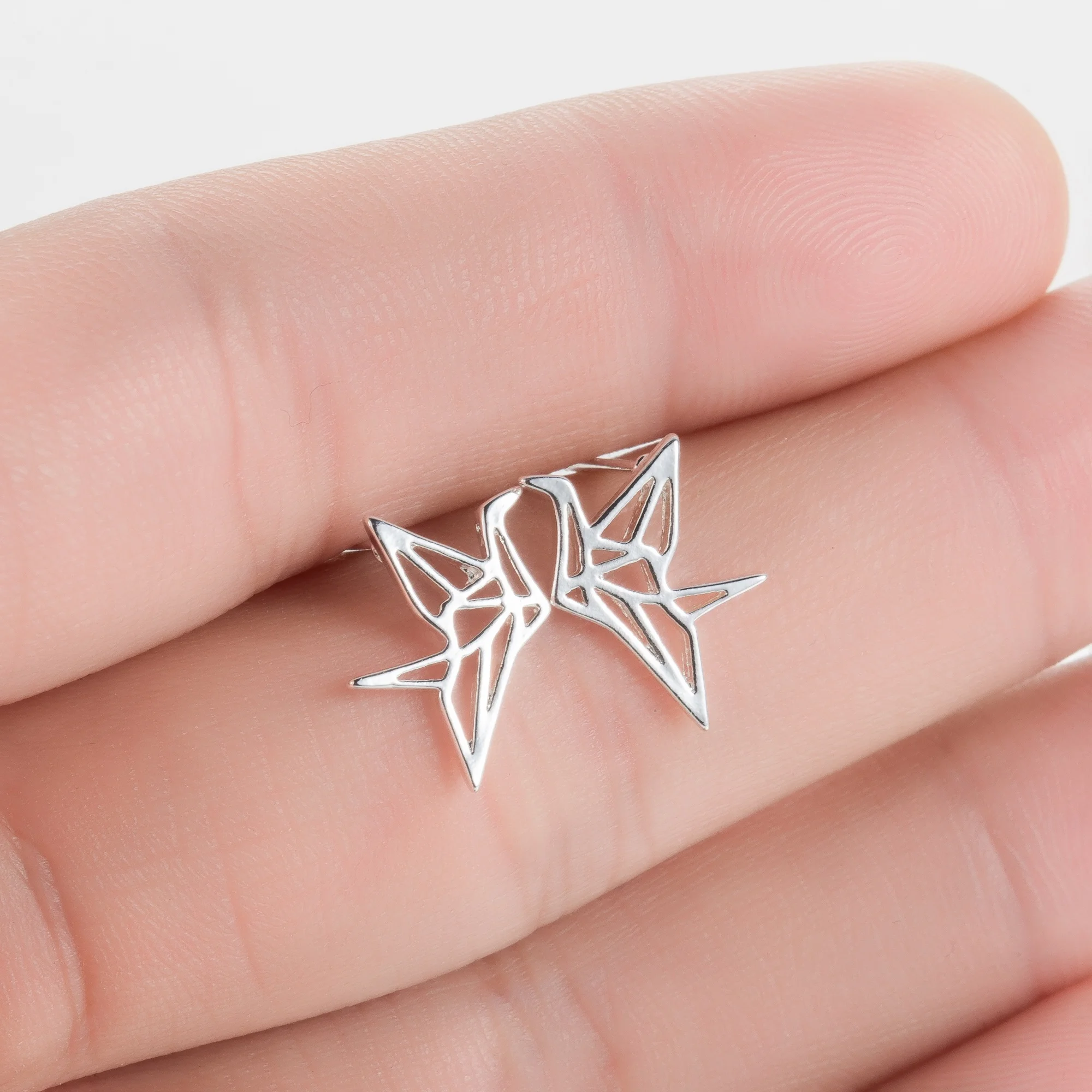 

Wholesale fashion stainless steel earrings jewelry women's Hollow Bird Earring Studs earrings mini bird gift girl