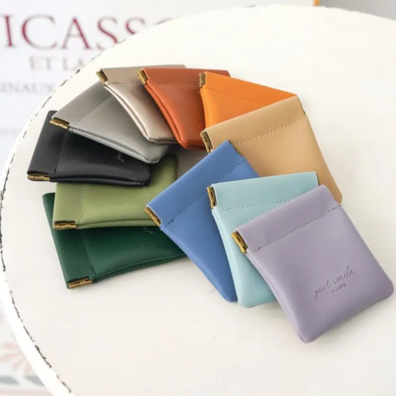 

2021 Environmental Leather Squeeze Change Earphone Money Holder Bag Mini Coin Purse Pouch