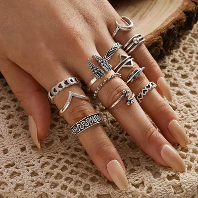 

Retro Design 12pcs Silver Color Wing Leaf Mid Finger Ring Stacking Moon Love Heart Knuckle Ring Set