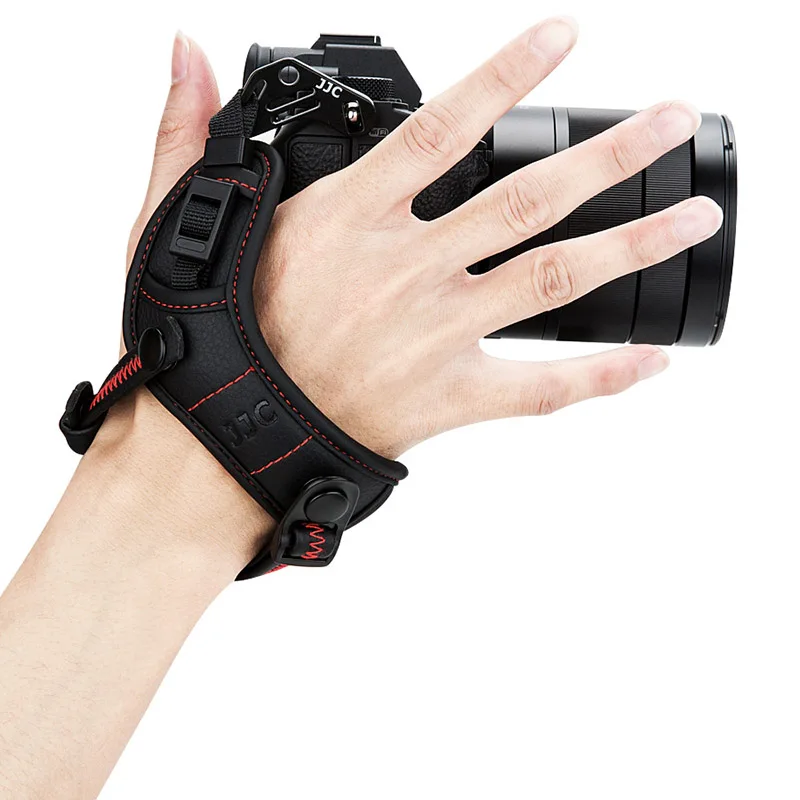 

JJC HS-ML1M Adjustable Hand and Wrist Strap with mount for Canon Nikon Sony Fujifilm Olympus Pentax Panasonic Mirrorless Cameras, Black red