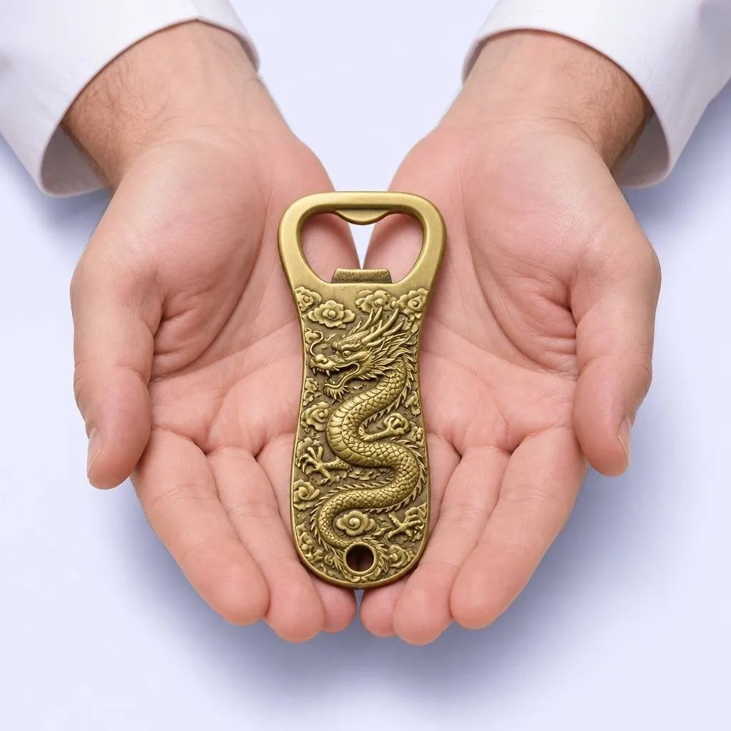 Bronze dragon bottle opener in cupped hands