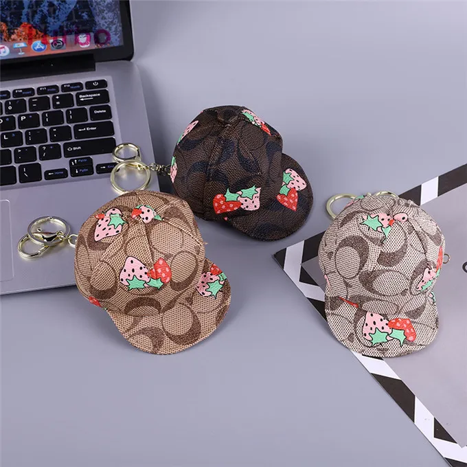 

fashion cute portable and light weight OEM custom printed creative hat shapes pu leather zipper mini key case key bag coin bag, Multiple colors