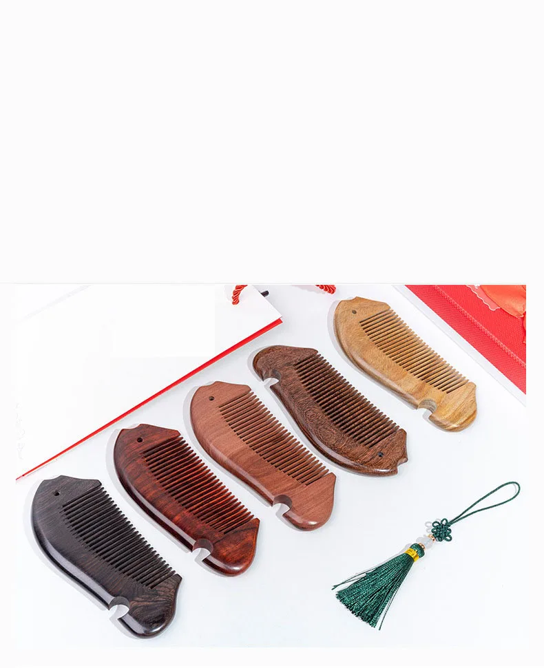 

Customized business convenient andConvenit wood box comb, fish-shaped anti-static peach wood/sandalwood massage beard/hair comb