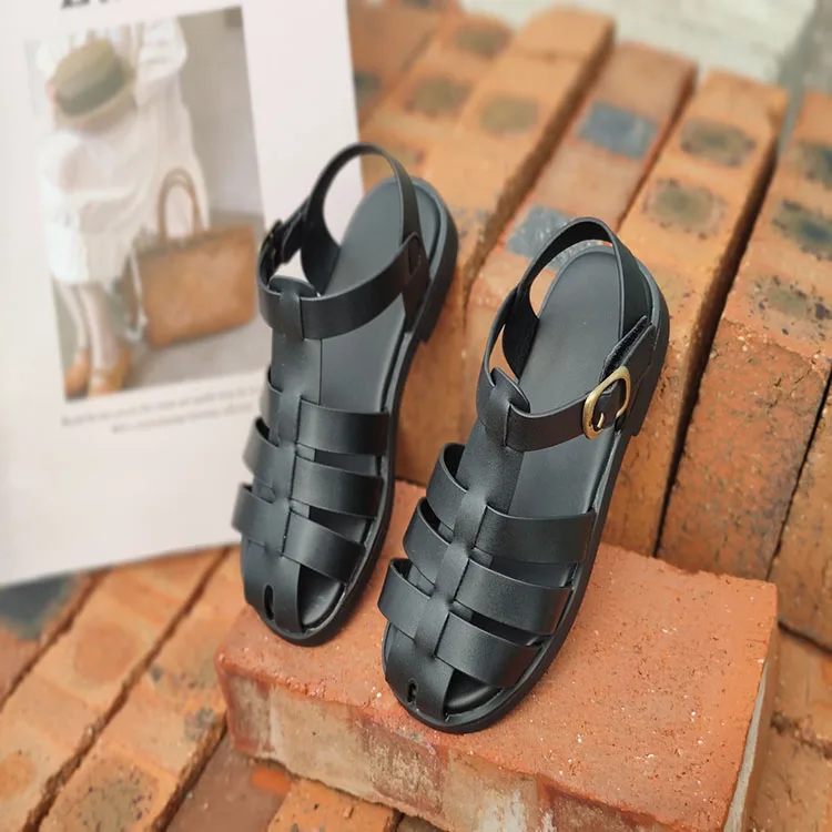 

Baotou Roman sandals 2021 summer new package feet retro woven flat bottom hollow wild children's sandals