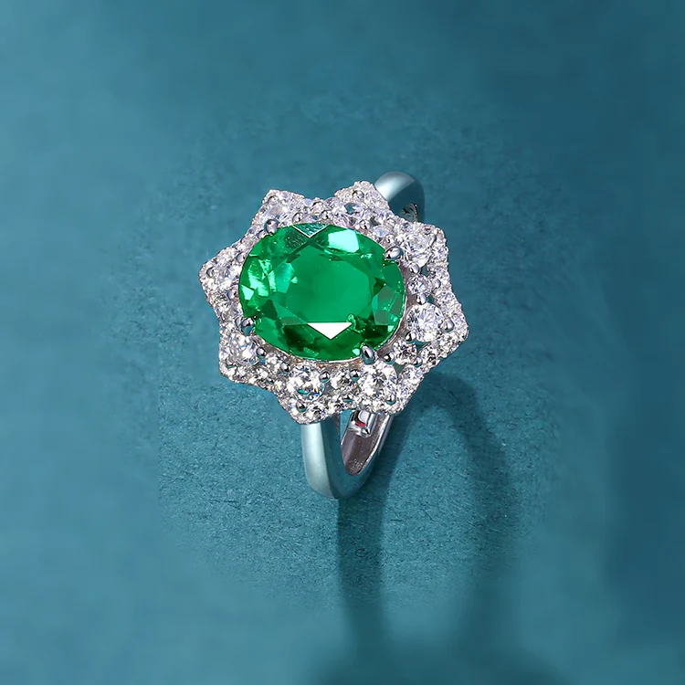 

2.4 ct synthetic emerald s925 silver engagement ring with zircon pave around