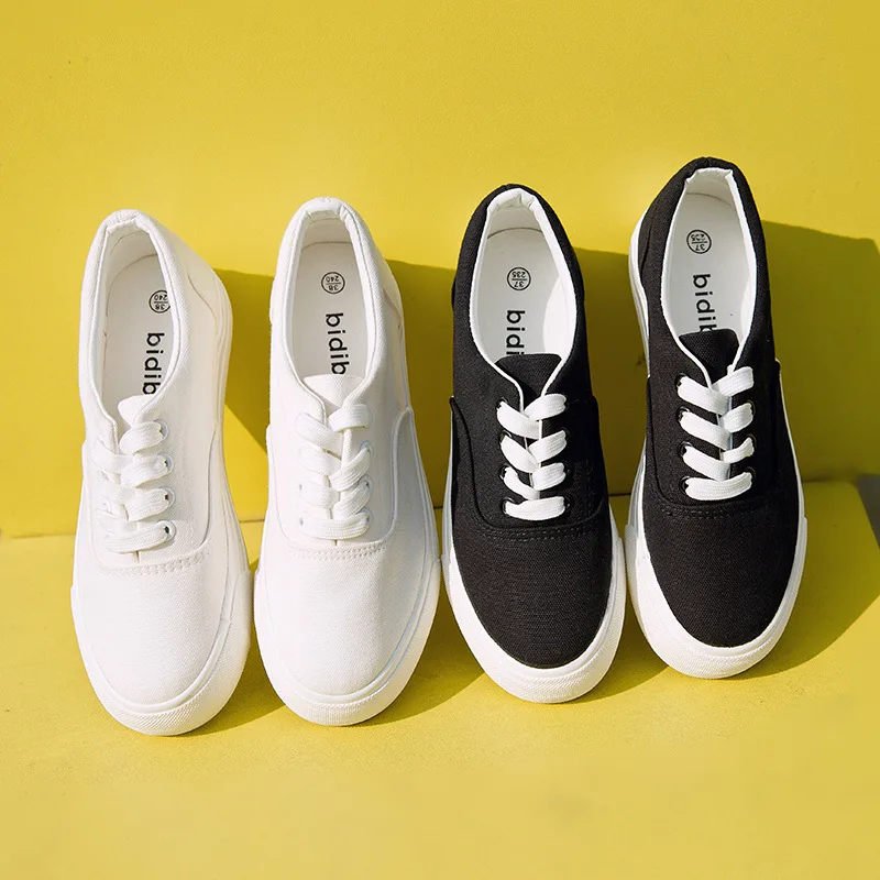 

sh11313a Solid white and black color wome fashion sneaker campus girls canvas shoes 2021