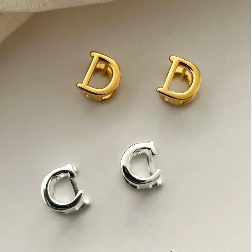 

VIANRLA 925 sterling silver D letter gold plated huggie earring