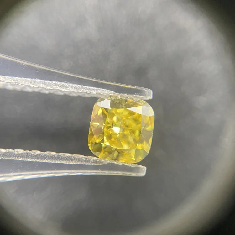 

Synthetic HPHT fancy vivid yellow lab grown CTI certified 1.06ct SI2 Cushion cut loose polished yellow diamond