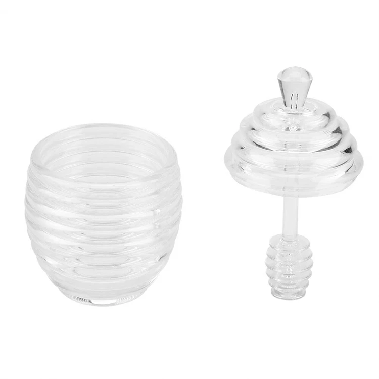 

Wholesale Plastic Small Bee Vintage Shaped with Spoon Stick Honey Pot Honey Jar with Lid, White