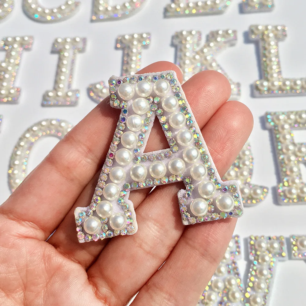 

Alphabet Pearl Rhinestone Words Ironing on Patches Applique 3D Handmade DIY Patch Cute Initial Letter Patches, One white stock image color