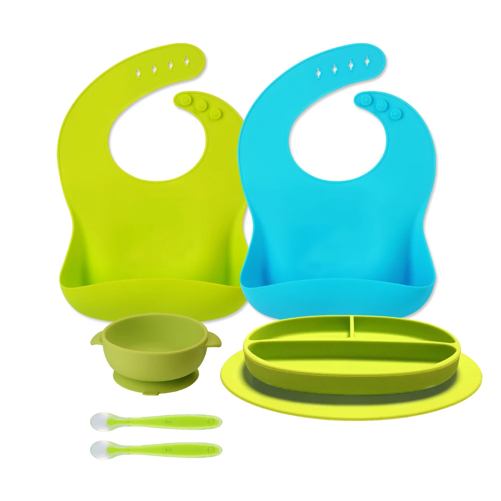 

Wholesale silicone baby feeding set feed baby food supplies include baby bib suction bowl spoon and plate, Customized color avaliable