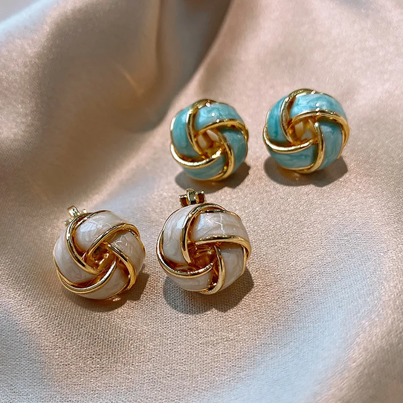 

fashion trendy entangled metal stud earrings 2021