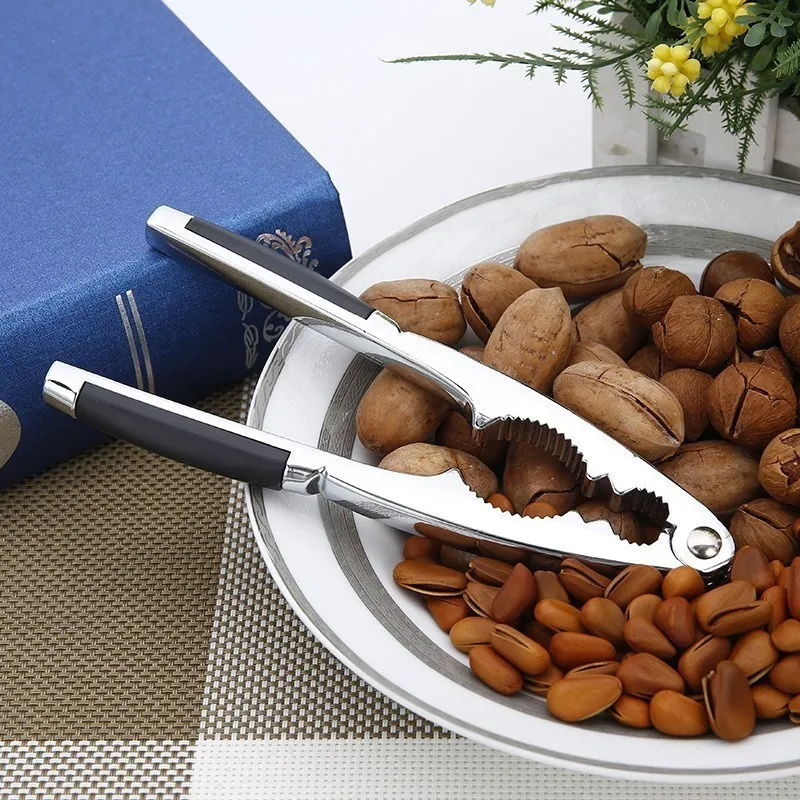 chrome nut cracker,heavy-duty,walnut opener of arc zinc alloy,ki