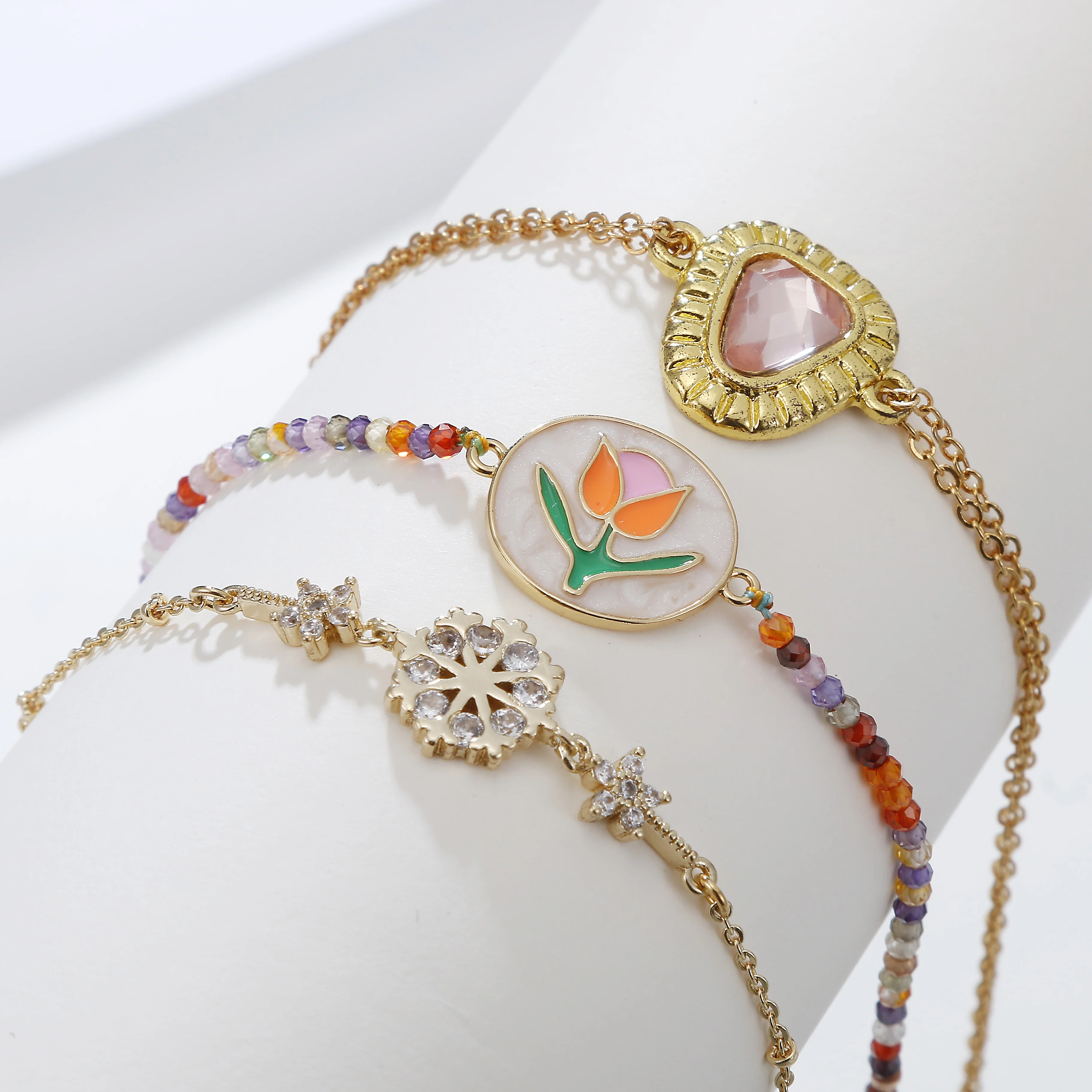 

Dropshipping Trendy Enamel Flower Snowflake Natural Stone Gold Figaro Hand Chain Bracelet for Women, Picture