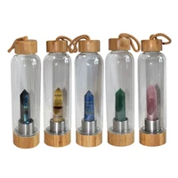 

Customized logo High quality glass natural crystal point healing water bottle with Bamboo lid