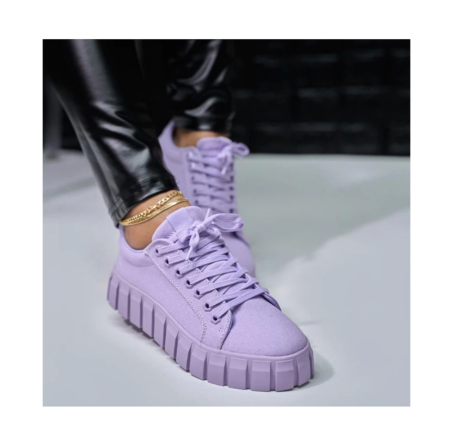 

2023 summer new European and American lace-up solid color light mouth round head large size women's canvas single shoes