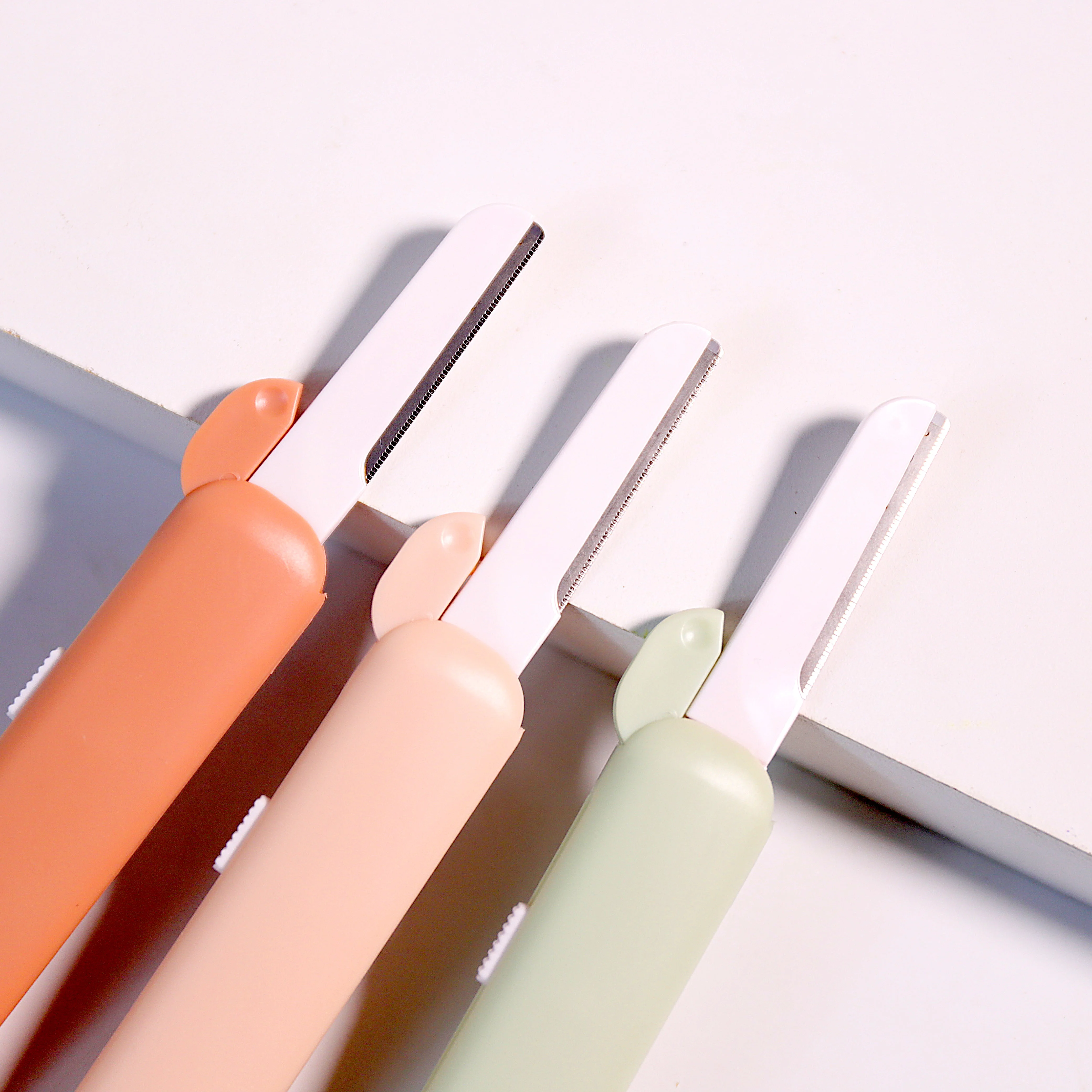 

Private Label Safety Retractable Facial Trimmer Eyebrow Razor Stainless Steel Blade, Mixed color