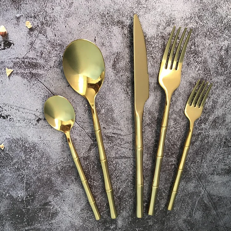 

Amazon New bamboo Round shape handle gold 304 stainless steel knife fork and spoon set flatware set