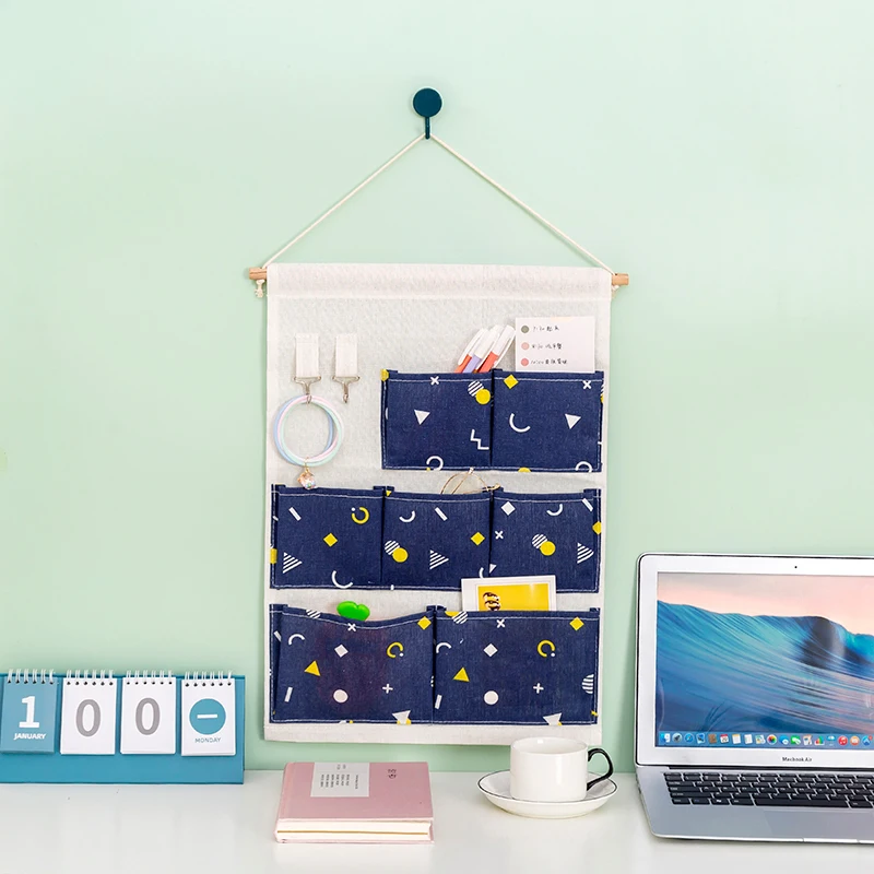 

Simulated linen 7 pockets bathroom hanging wall organizer with metal hooks