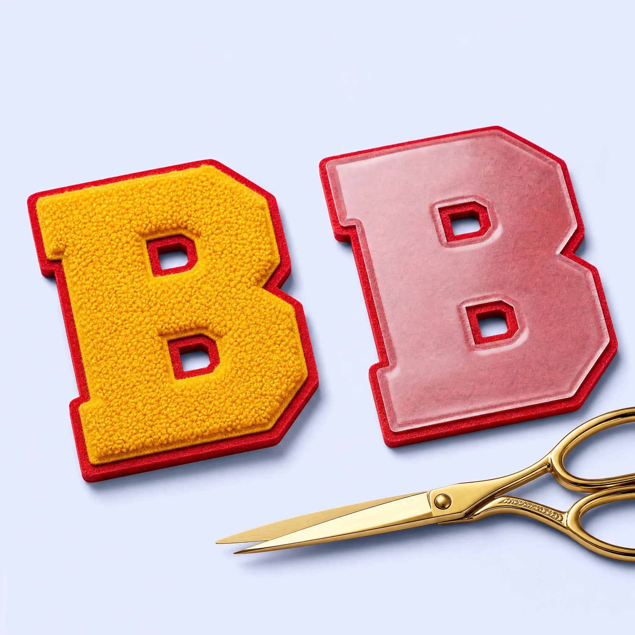 Varsity Chenille Letter B Front with Smooth Transparent Heat-Activated Iron-On Backing and Gold Tailoring Scissors