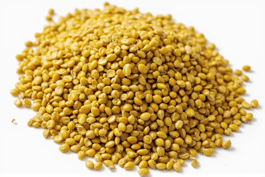 Collection of different mustard seed varieties showing color and size differences between yellow, brown, and black seeds