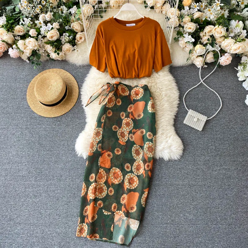 

Wholesale 2021 Summer New Holiday Style Printing Suit Women's T-shirt All-match High Waist Design Irregular Skirt Women Sets