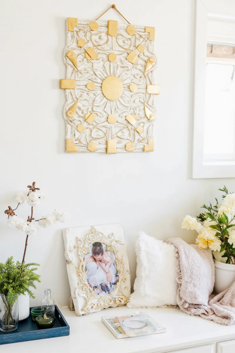 Close-up of white cable protector installed along a baseboard, color-matched to the wall.