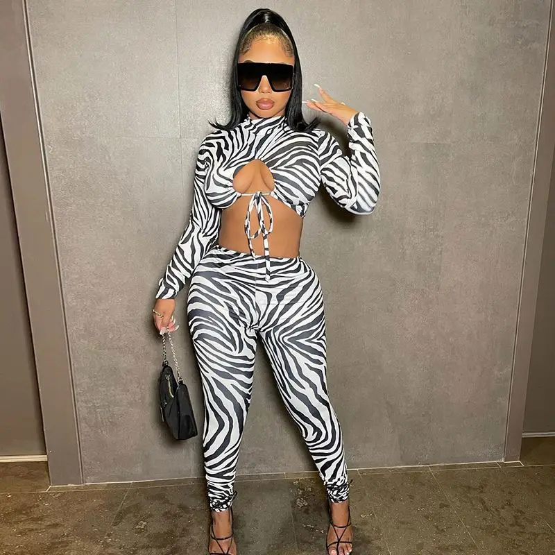

Free Sample Trendy Zebra Printed Two Piece Set Crew Neck Hollow Out Long Sleeve Crop Top Elastic Waist Two Piece Pants Set