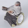 Solar singing bird sitting on house statue sensor garden lighting for sale