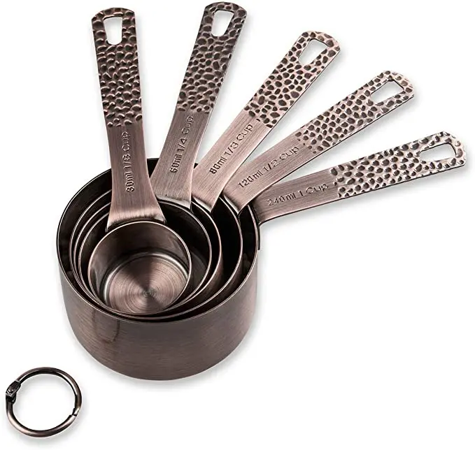 

11 copper-plated stainless steel measuring cups and spoons