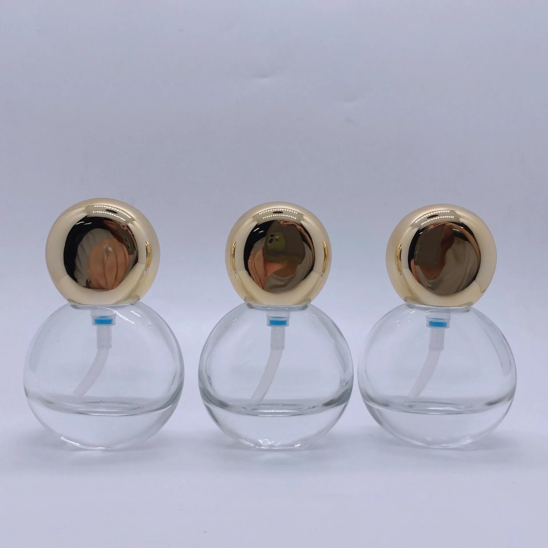 

Cosmetic 30ml shaped thick bottom foundation recycle serum pump clear glass essential oil bottle